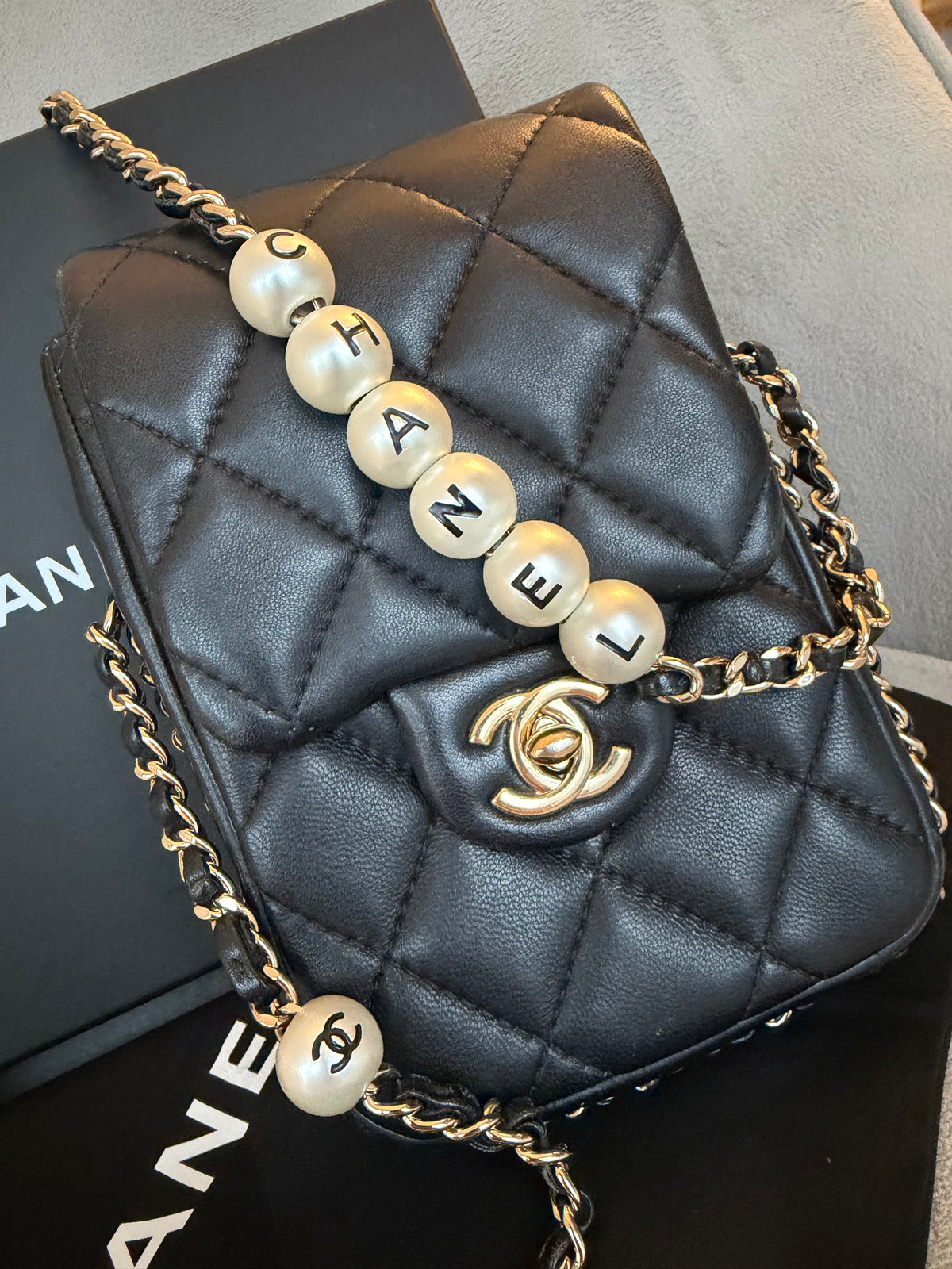 Chanel Pearl Letter Mini Phone Pouch in Black Quilted Lambskin