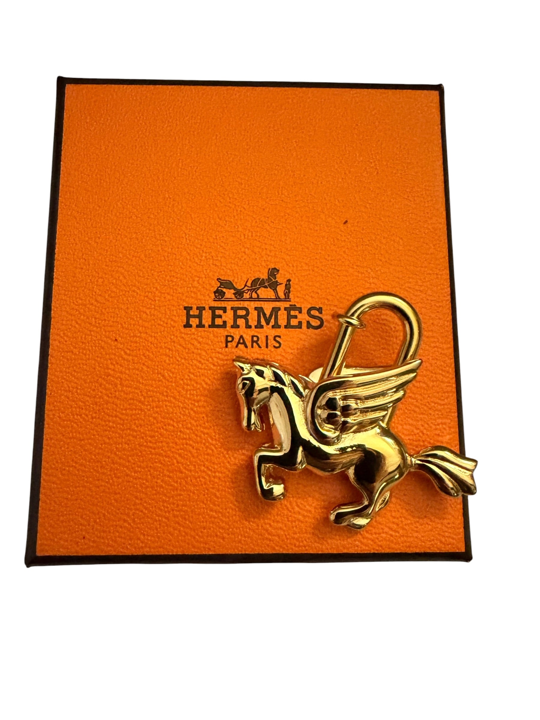 Hermès Pegasus Cadena Lock Charm in GHW